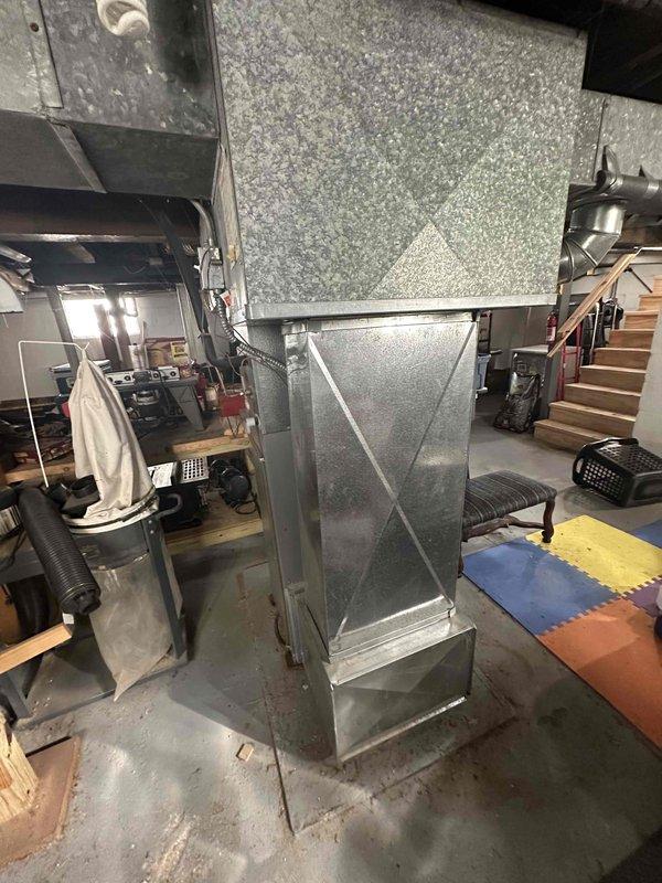 Conducted comprehensive assessment of existing HVAC system and electrical infrastructure for complete system replacement. Evaluated current electrical panel capacity and circuit configuration to ensure compatibility with new equipment specifications. Documented existing ductwork system, including main supply trunk and structural support components, to determine modification requirements for optimal airflow and equipment integration with proposed replacement unit.