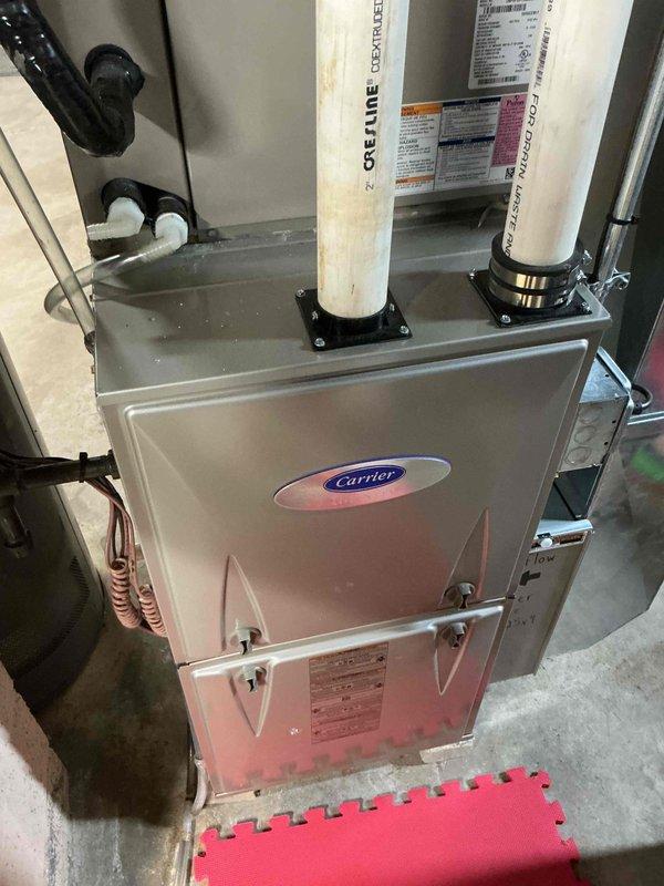 Completed comprehensive tune-up and safety inspection on Carrier residential furnace system. Performed standard maintenance procedures including filter inspection, burner assessment, heat exchanger examination, blower motor evaluation, and verified proper operation of all safety controls and venting systems. All components found operating within manufacturer specifications with no immediate service needs identified.