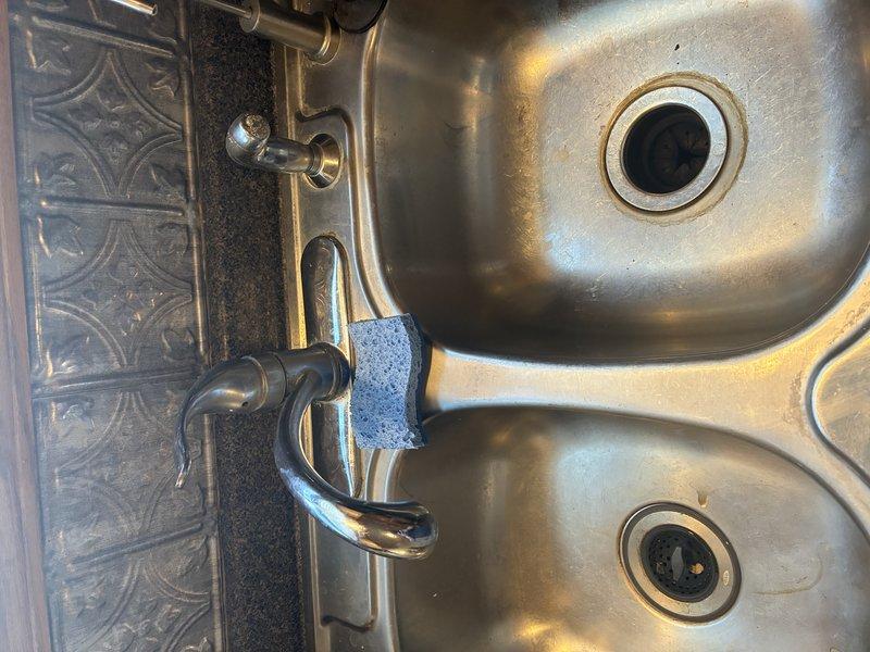 Completed installation of kitchen sink plumbing system, including connection of new stainless steel double-basin sink with faucet assembly. Ran supply lines and drain piping through wall cavity, installed junction box and necessary electrical connections to support disposal or related fixtures, and secured all plumbing connections to ensure proper water flow and drainage functionality.