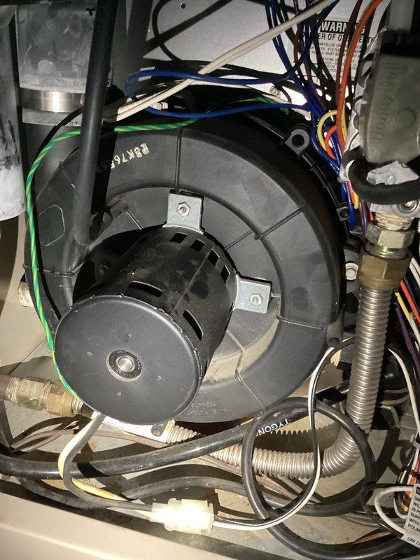 Performed preventive maintenance and inspection on Lennox Elite Series high-efficiency gas furnace. Accessed and inspected blower motor assembly, verified proper operation of all electrical connections and components, and confirmed condensate drainage system functionality. All system components found to be operating within normal parameters, with furnace cycling properly and venting correctly through PVC exhaust pipes.