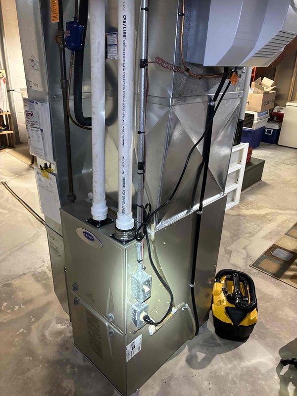 Completed comprehensive tune-up service on residential furnace system in basement mechanical room. Performed standard maintenance protocol including inspection of heat exchanger, burner assembly, and blower components; verified proper operation of all safety controls and limit switches; checked and documented ductwork connections and condensate drainage system. All equipment operating within manufacturer specifications with no deficiencies noted at time of service.