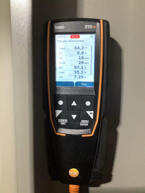 Performed comprehensive HVAC system maintenance and diagnostics on heating unit. Conducted flue gas analysis using Testo 310 combustion analyzer, confirming optimal performance with stack temperature of 84.2°F, oxygen level at 8.0%, carbon monoxide at 18 ppm, and combustion efficiency at 97.1%. Inspected internal electrical components and replaced defective fuse to restore proper system operation.