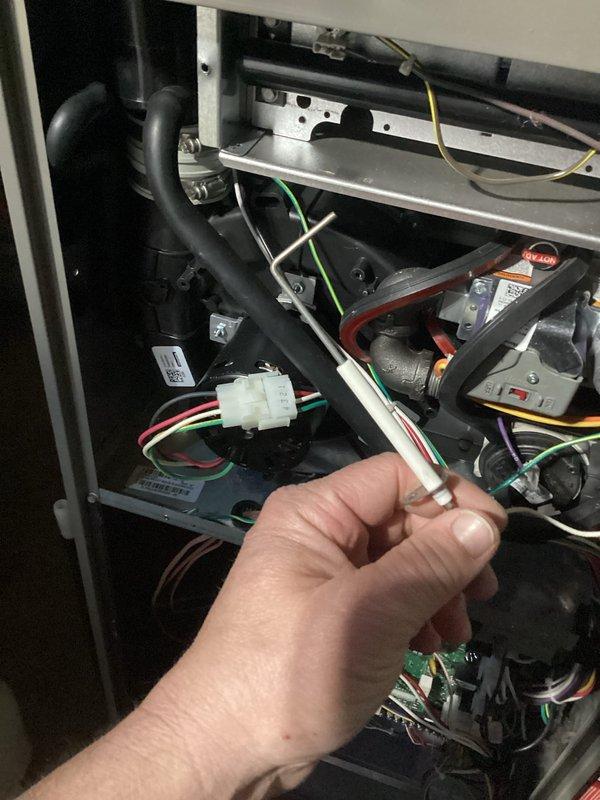 Performed comprehensive HVAC system maintenance and diagnostics on heating unit. Conducted flue gas analysis using Testo 310 combustion analyzer, confirming optimal performance with stack temperature of 84.2°F, oxygen level at 8.0%, carbon monoxide at 18 ppm, and combustion efficiency at 97.1%. Inspected internal electrical components and replaced defective fuse to restore proper system operation.