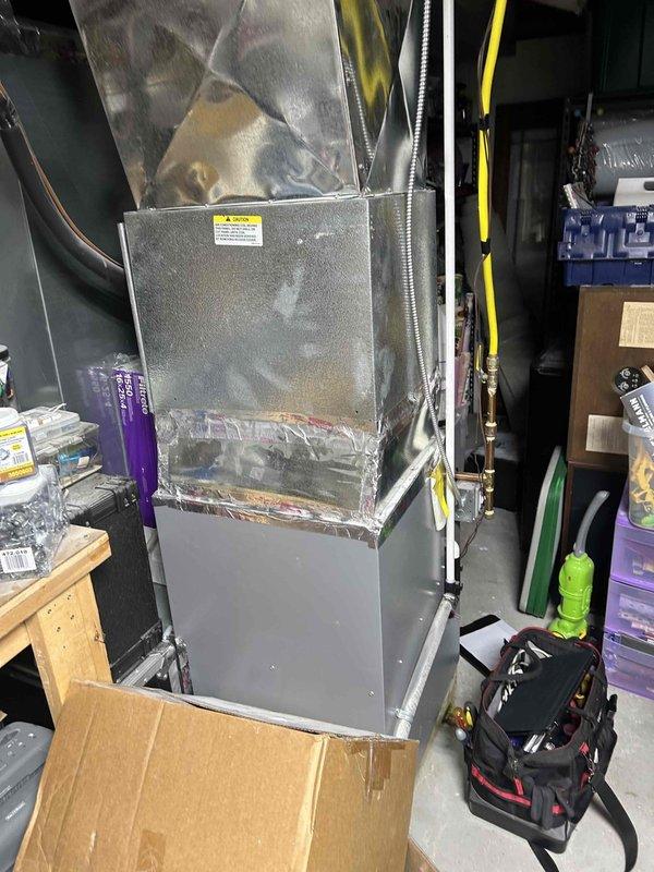 Completed HVAC system replacement estimate for residential property. Assessed existing Royalton furnace unit located in utility room, evaluating current ductwork configuration including flexible metal ducts, PVC intake/exhaust venting system, and associated copper piping connections. Documented equipment condition, spatial constraints, and installation requirements to provide comprehensive replacement recommendations for upgraded heating and cooling system.