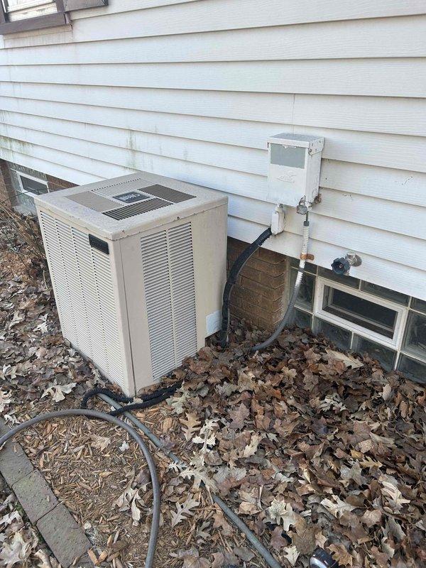 Conducted comprehensive HVAC system evaluation for indoor air quality estimate at residential property. Assessment included inspection of basement mechanical equipment featuring Rheem water heater and furnace unit with existing ductwork configuration, as well as exterior condensing unit with refrigerant line set and electrical disconnect. Documented current system layout and infrastructure to provide recommendations for IAQ enhancement solutions.