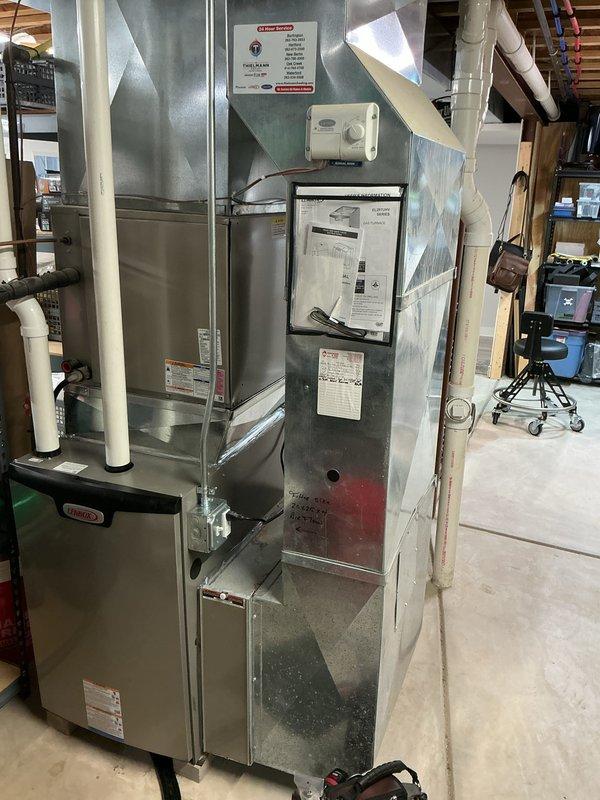 Completed scheduled preventive maintenance inspection on residential HVAC system located in basement utility area. Performed comprehensive system evaluation including visual inspection of furnace unit, air handler, and associated components. Verified proper operation of control systems, checked condensate drain lines for proper flow and drainage, and inspected ductwork connections for secure mounting and adequate sealing. All equipment found to be operating within normal parameters with no immediate service requirements identified at time of visit.