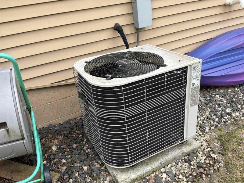 Completed full HVAC system replacement including installation of new Lennox furnace in basement utility area with proper PVC venting and a new outdoor condensing unit mounted on concrete pad. Both units were professionally installed with appropriate electrical connections, ductwork integration, and proper drainage to ensure optimal system performance and efficiency.