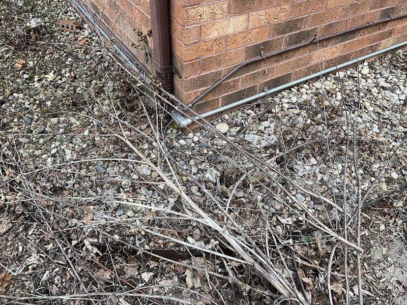 Conducted site assessment for mini split installation at brick exterior building. Evaluated exterior mounting location at building corner near downspout and reviewed existing electrical panel capacity with available circuit breaker spaces for new dedicated circuit requirements. Documented installation site conditions and confirmed electrical infrastructure compatibility for proposed ductless mini split system.