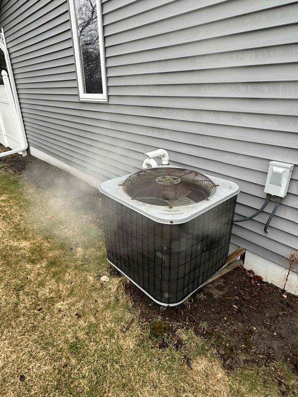 Completed HVAC system evaluation for equipment replacement estimate. Inspected existing outdoor condensing unit with deteriorated cabinet and aging components, along with indoor air handler showing signs of wear including soiled filtration media. Documented current system configuration including refrigerant line set routing, electrical connections, and drainage piping. Assessed equipment placement, pad condition, and accessibility for potential replacement unit installation. Provided comprehensive replacement recommendations based on current system age, efficiency ratings, and observed component degradation.