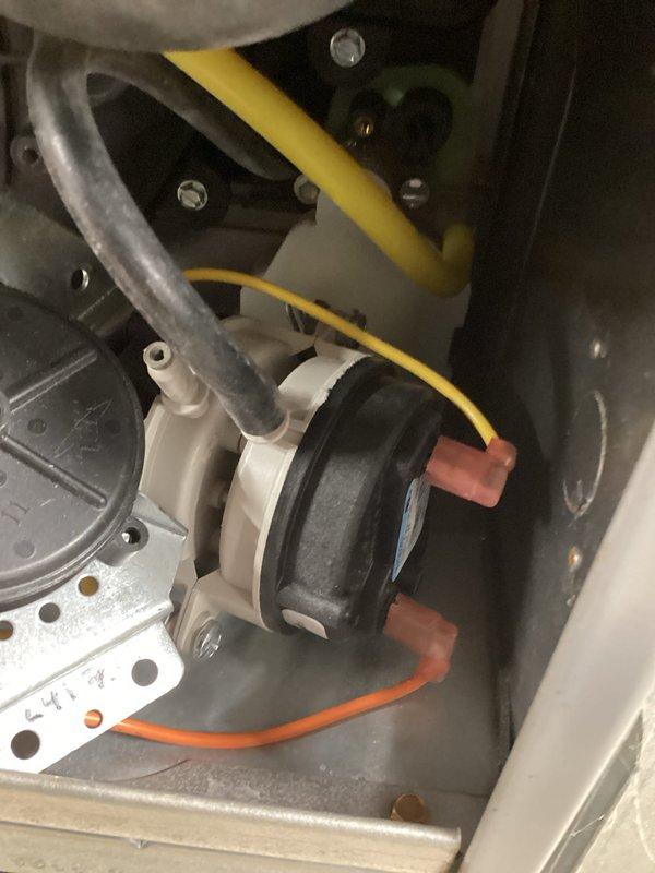 # HVAC Service Call - No Heat Condition

## Equipment Information
Furnace system, 10+ years old, high-efficiency condensing unit with electronic ignition control

## Problem Description
Unit not producing heat. Homeowner reported complete loss of heating function.

## Diagnostic Findings
Upon arrival, performed visual inspection and system diagnostics. Removed front access panel to examine internal components. Control board showed illuminated LED indicators suggesting power to the unit. Inspected blower motor assembly, inducer motor, and associated electrical connections. Examined condensate drainage system including pump assembly and discharge piping. All wire connections at motor terminals and control board appeared secure with no signs of burning or corrosion.

## Work Performed
Tested control board functionality and verified proper voltage supply. Inspected pressure switches and associated tubing for blockages or disconnections. Examined flame sensor and ignition system components.