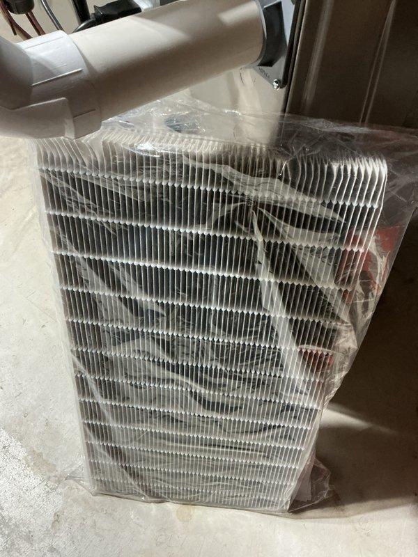 Installed new Carrier 59MN7C080C17 80,000 BTU gas furnace with evaporator coil assembly. Unit commissioned and verified operational per manufacturer specifications, including proper electrical connections at 115V/60Hz/1-phase and gas manifold pressure settings.