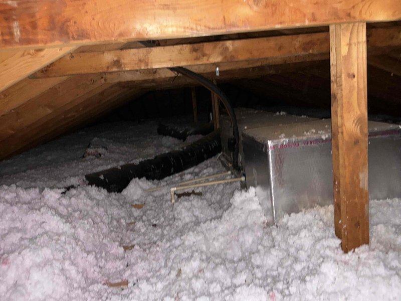 Conducted comprehensive HVAC system evaluation for complete equipment replacement. Assessed existing thermostat location in main hallway and inspected attic-mounted air handler unit and ductwork system, including flexible duct connections and insulation conditions. Provided detailed replacement estimate covering new high-efficiency heating and cooling equipment, proper sizing calculations, and installation specifications to meet current residential comfort requirements.