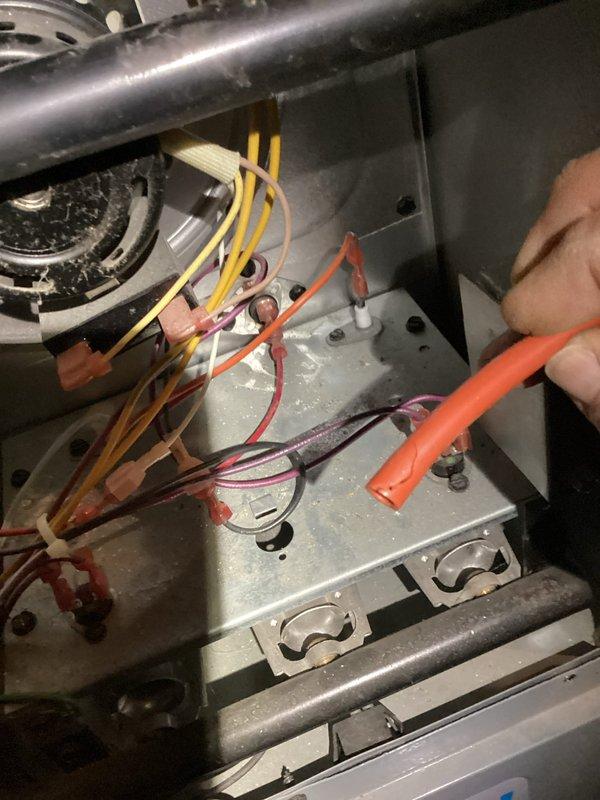 Responded to no heat call on HVAC system less than 10 years old. Upon inspection, found loose or disconnected low-voltage wiring at the furnace control board that was preventing the heating system from receiving proper signal from the thermostat. Reconnected and secured all low-voltage wire connections at the control board terminals, verified proper wire placement according to manufacturer specifications, and tested system operation. Unit fired successfully and restored heat to the residence.