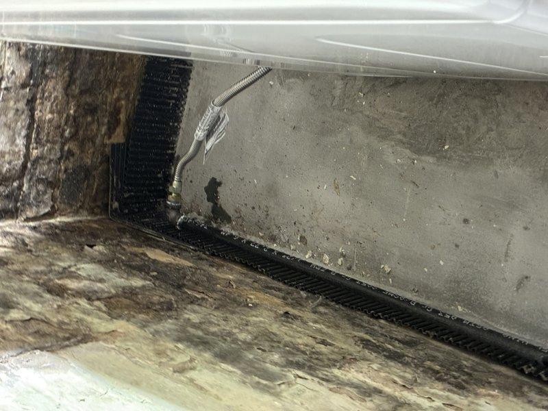 Responded to gas leak concern and performed comprehensive pressure test of gas piping system. Upon inspection, identified deteriorated flexible gas connector with visible corrosion and compromised sealing at junction point near HVAC equipment. Testing confirmed pressure drop indicating active leak at connector interface. Replaced defective flexible gas line with new code-compliant connector, pressure tested system to 15 PSI for 15 minutes with zero pressure loss, and verified all connections with leak detection solution. System restored to safe operating condition and all gas appliances confirmed functional.