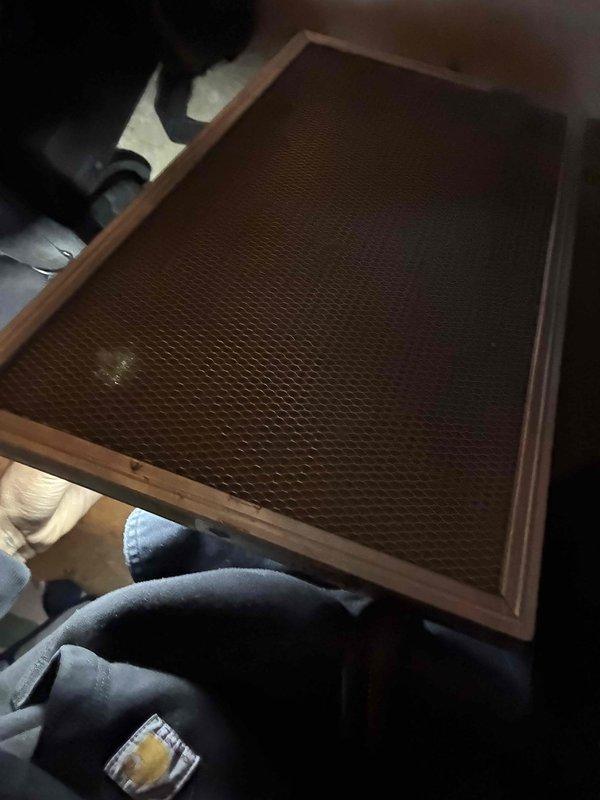 Completed install callback for HVAC system. Verified programmable thermostat installation and proper operation, confirming display functionality, temperature controls, and system mode settings. Inspected and documented air filter condition with wood-framed media filter in place and operating correctly.