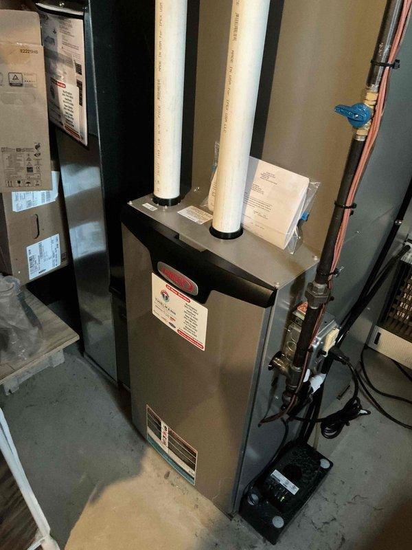 Completed scheduled HVAC maintenance inspection on residential furnace and air handler system. Performed visual inspection of all accessible components including furnace unit, air handler, ductwork, PVC venting system, and associated plumbing connections. Verified proper installation and condition of intake/exhaust venting, checked manufacturer labels and specifications for compliance, and inspected copper piping, electrical conduit, and system connections. All equipment found to be in clean, functional condition with no immediate service needs identified during this prepaid maintenance visit.