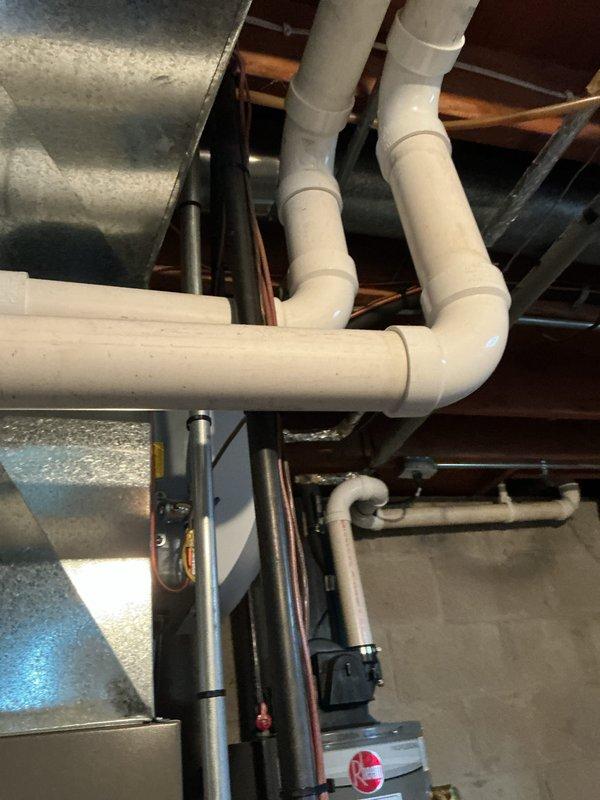 Completed scheduled HVAC maintenance inspection on residential furnace and air handler system. Performed visual inspection of all accessible components including furnace unit, air handler, ductwork, PVC venting system, and associated plumbing connections. Verified proper installation and condition of intake/exhaust venting, checked manufacturer labels and specifications for compliance, and inspected copper piping, electrical conduit, and system connections. All equipment found to be in clean, functional condition with no immediate service needs identified during this prepaid maintenance visit.
