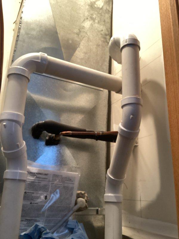 Completed comprehensive tune-up and safety inspection on residential HVAC system. Performed detailed examination of furnace components including pressure switch assembly, electrical connections, and wiring harness; verified all wire terminations secure and properly connected. Inspected condensate drain system with PVC piping configuration, confirmed proper drainage and trap functionality. All system components tested and operating within manufacturer specifications.