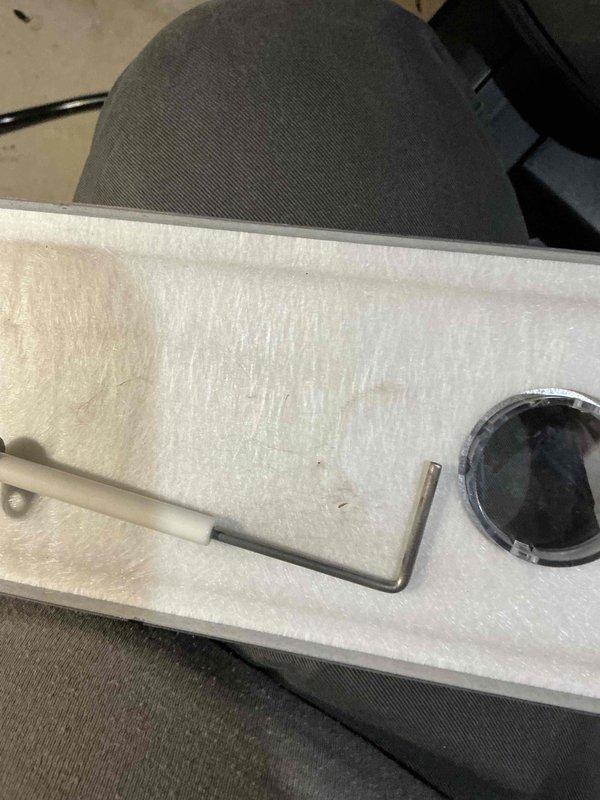 Completed prepaid HVAC maintenance visit and performed system inspection. Examined condensate drain assembly components including PVC piping, drain line connections, and associated hardware. Verified proper installation and functionality of drain system with elbow joints and vertical piping sections. Inspected HVAC unit housing, ductwork, and mechanical controls including valve mechanisms. System found to be operating within normal parameters with all components properly secured and functioning as designed.