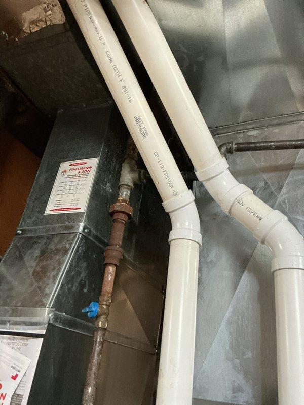 Completed scheduled prepaid maintenance visit on residential air handler unit located in attic space. Performed comprehensive system inspection including examination of condensate drainage lines, refrigerant connections, and electrical components. Air handler unit found in operational condition with copper refrigerant lines showing normal patina consistent with system age. Verified condensate drain system functionality and confirmed all mechanical components secured properly. System operational at time of departure.