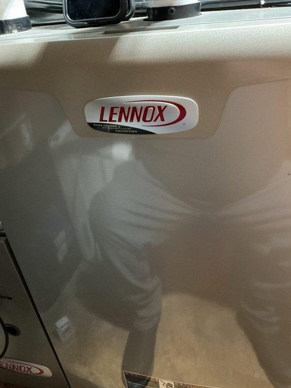 Completed routine maintenance inspection on Lennox Dave Lennox Signature Collection furnace unit. Accessed internal components through main service panel, inspected gas valve assembly, refrigerant lines, ignition system, and electrical connections. All copper tubing, wiring harnesses, and mechanical components found to be in proper working condition with no immediate service needs identified.