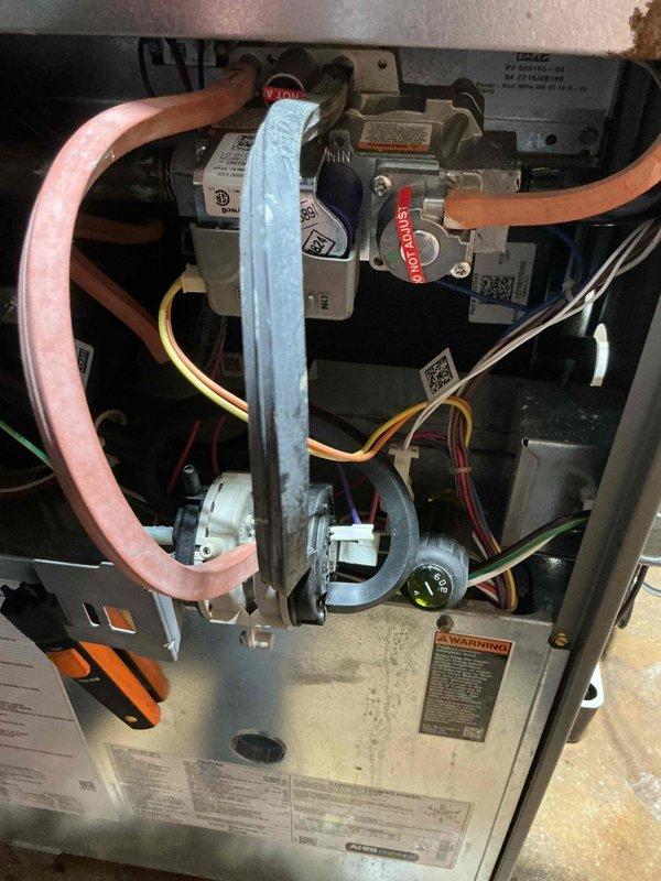 Completed routine maintenance inspection on Lennox Dave Lennox Signature Collection furnace unit. Accessed internal components through main service panel, inspected gas valve assembly, refrigerant lines, ignition system, and electrical connections. All copper tubing, wiring harnesses, and mechanical components found to be in proper working condition with no immediate service needs identified.