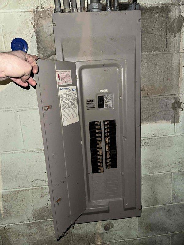 Conducted comprehensive assessment of existing HVAC system and mechanical infrastructure for replacement estimate. Evaluated current heating and cooling equipment configuration, including inspection of mechanical room plumbing connections, expansion tank installation, and associated piping systems. Documented electrical service panel specifications and capacity to determine compatibility requirements for new HVAC equipment installation.