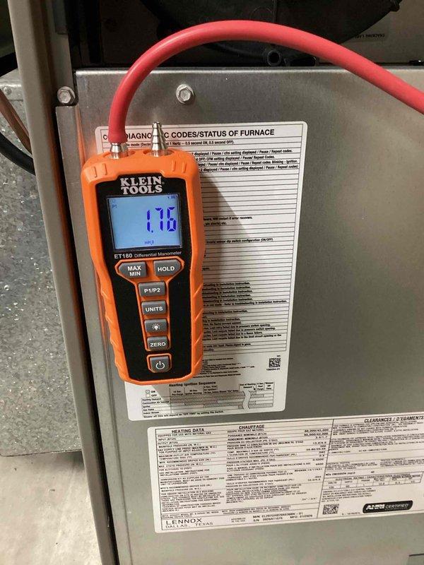 Completed full HVAC system installation including new Lennox furnace and outdoor condensing unit. Installed furnace in interior mechanical space with proper venting and gas connections, mounted outdoor Lennox condenser on composite pad against building exterior with appropriate clearances, and established refrigerant lines between indoor and outdoor components. Configured PVC condensate drainage system, made all electrical connections including disconnect box, and verified system operation using differential manometer to confirm proper gas pressure at 1.10" W.C. All diagnostic codes reviewed and system commissioned successfully with equipment operating within manufacturer specifications.
