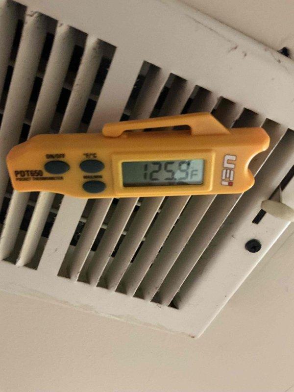 Performed routine HVAC maintenance agreement inspection on residential system. Conducted airflow measurements at supply register using calibrated digital anemometer, recording supply air temperature of 125.93°F, which indicates proper heating operation. Completed visual inspection of system components and documented conditions with photographs for maintenance records.