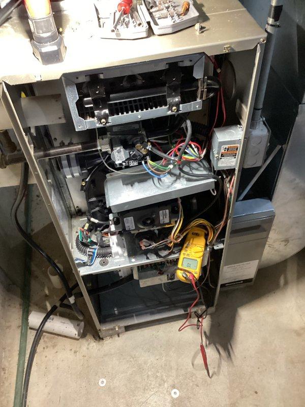 Performed comprehensive tune-up on residential gas furnace system, including full inspection of heat exchanger, blower assembly, and electrical components. Conducted diagnostic testing with multimeter to verify proper voltage and amperage readings across all control boards and safety circuits. Cleaned and inspected burner assembly, confirmed proper airflow, and verified all electrical connections were secure and functioning within manufacturer specifications.