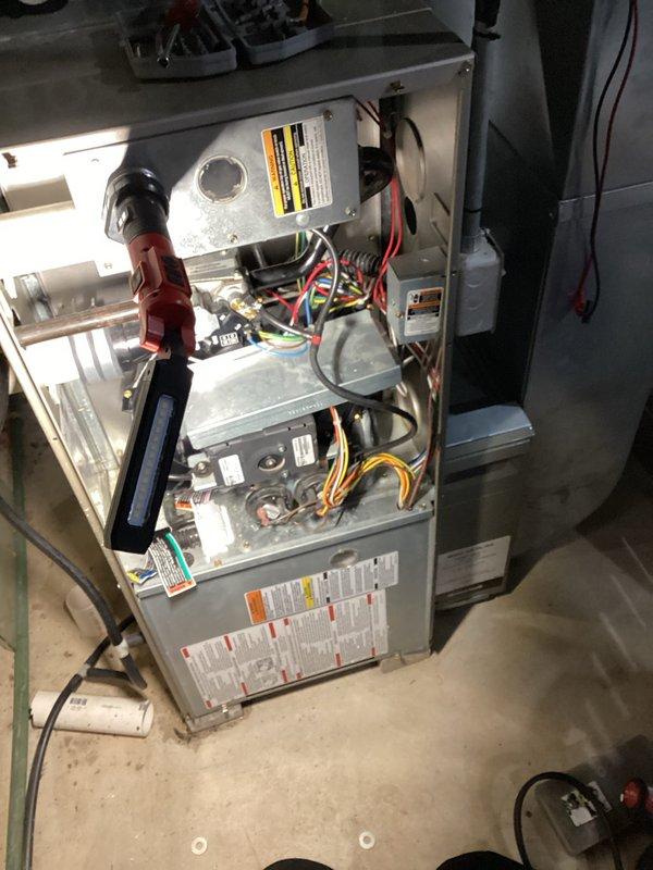Performed comprehensive tune-up on residential gas furnace system, including full inspection of heat exchanger, blower assembly, and electrical components. Conducted diagnostic testing with multimeter to verify proper voltage and amperage readings across all control boards and safety circuits. Cleaned and inspected burner assembly, confirmed proper airflow, and verified all electrical connections were secure and functioning within manufacturer specifications.