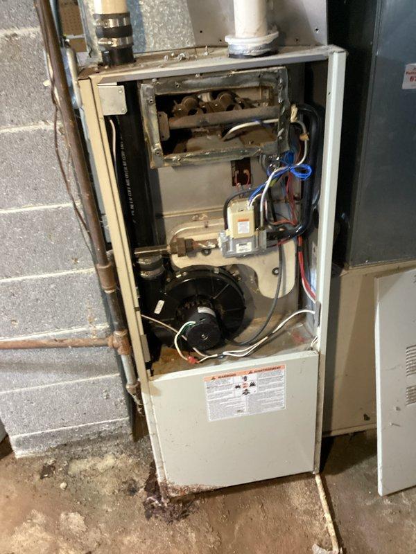 Responded to no heat call on residential gas furnace over 10 years old. Upon arrival, removed access panel and performed diagnostic inspection of unit revealing failed ignition control module preventing burner operation. Replaced faulty ignition control board, tested all electrical connections, verified proper voltage supply, and cycled unit through multiple heating cycles to confirm successful ignition sequence and proper burner operation. System restored to full heating capacity with all safety controls functioning within manufacturer specifications.