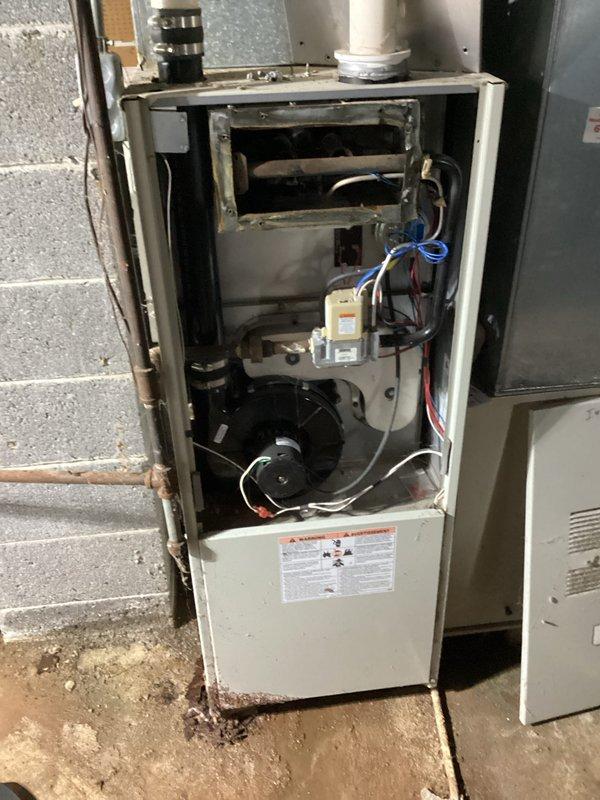 Responded to no heat call on residential gas furnace over 10 years old. Upon arrival, removed access panel and performed diagnostic inspection of unit revealing failed ignition control module preventing burner operation. Replaced faulty ignition control board, tested all electrical connections, verified proper voltage supply, and cycled unit through multiple heating cycles to confirm successful ignition sequence and proper burner operation. System restored to full heating capacity with all safety controls functioning within manufacturer specifications.