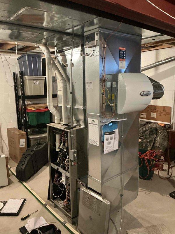 Completed comprehensive HVAC system replacement estimate for residential property, evaluating existing outdoor condensing unit and indoor air handler system. Assessment included inspection of current equipment placement, ductwork configuration, and mechanical room conditions to provide recommendations for complete system upgrade with proper sizing and installation requirements for both exterior and basement components.