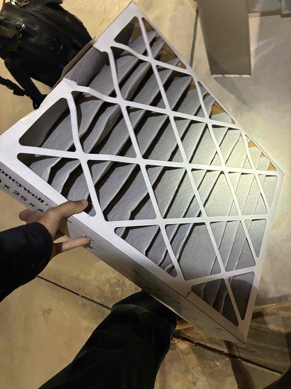 Completed scheduled HVAC maintenance on prepaid service plan. Inspected air filter and ductwork system, confirming proper airflow and system cleanliness. Filter media showed appropriate filtration capacity with clean pleated material visible through lattice frame design. Interior ductwork inspection revealed galvanized metal construction in good condition with clean surfaces and intact seams throughout the air distribution system.