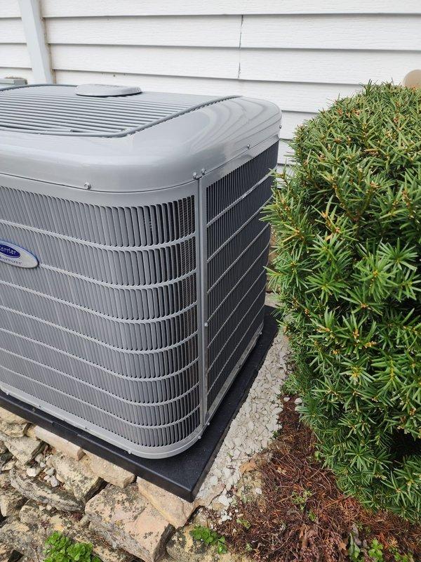 # HVAC Install - A/C & Coil

Completed installation of new outdoor air conditioning condenser unit and matching evaporator coil system. Unit was properly positioned on rubber isolation pad over concrete base with adequate clearance from structure and landscaping for optimal airflow and serviceability. All refrigerant lines were connected and system was charged to manufacturer specifications, as verified by manifold gauge readings showing proper operating pressures across multiple refrigerant scales. Electrical connections were completed per code requirements. System was tested for proper operation, with all safety controls and components functioning as designed. Installation site was left clean with unit secured and ready for service.