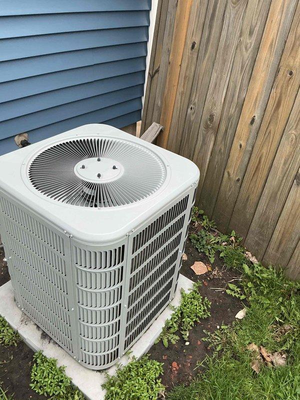 Completed routine maintenance on residential outdoor air conditioning condenser unit. Performed system diagnostics using digital clamp meter, recording electrical readings of 4.103 amps to verify proper compressor operation and system performance. Unit found in good operating condition with all components functioning within normal parameters.