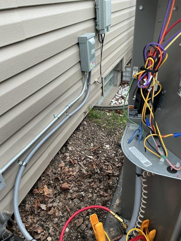 Completed installation and system start-up of outdoor HVAC unit with associated electrical disconnect, refrigerant line set, and junction box assembly. Performed refrigerant charging procedures, pressure testing, and verified all electrical connections and conduit installations were properly secured to manufacturer specifications.