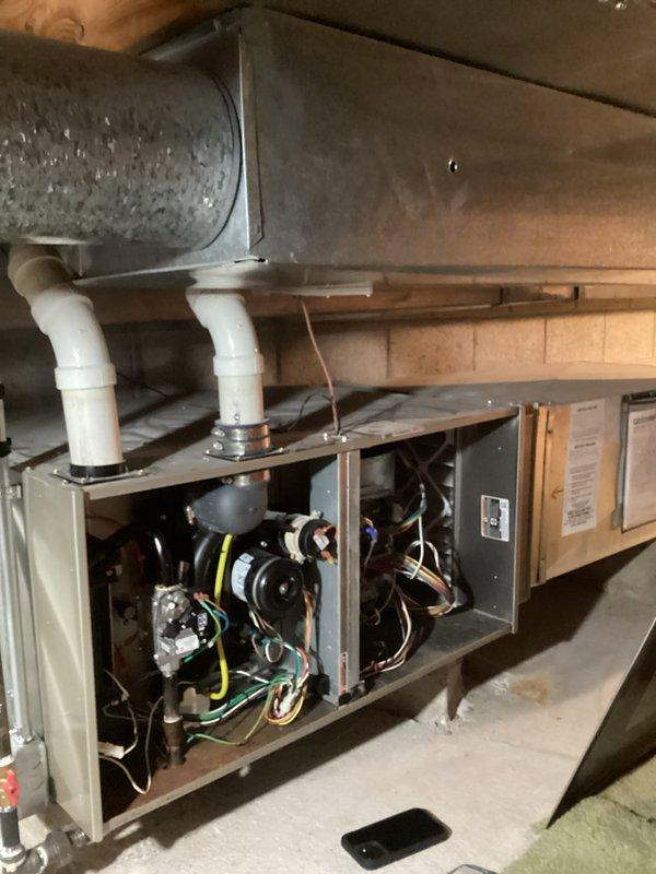 Completed scheduled prepaid maintenance visit on horizontal air handler system installed in basement utility area. Performed comprehensive system inspection including visual examination of blower assembly, electrical connections, control board, and refrigerant line connections. All internal components including motor, wiring terminals, and mechanical assemblies were found to be in operational condition with normal wear patterns. Condensate drain lines inspected and confirmed proper installation. System operating within normal parameters at time of service.