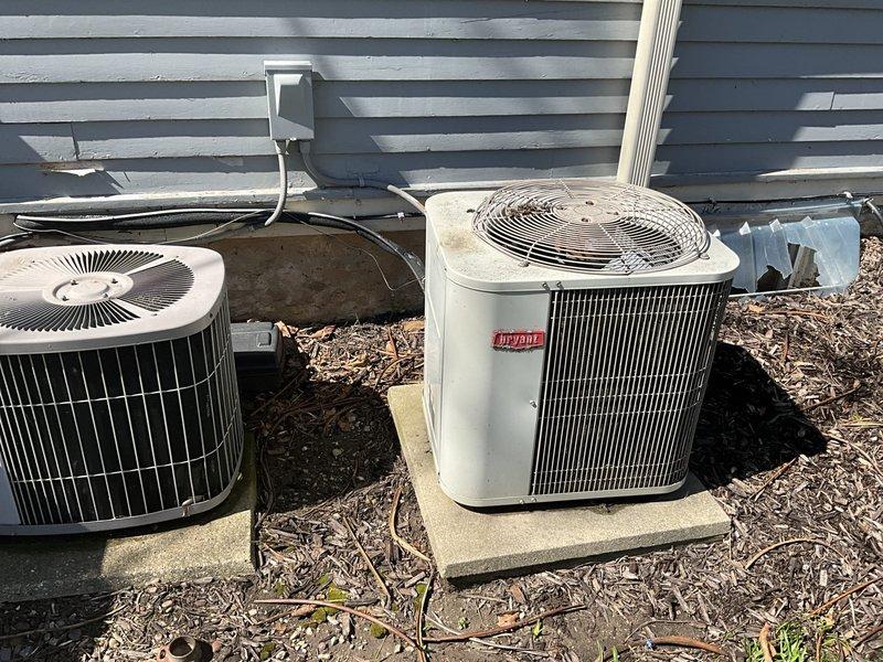Completed comprehensive evaluation of existing commercial HVAC system consisting of two outdoor condensing units showing significant age-related deterioration, dirt accumulation on condenser coils, and general wear. Provided detailed estimate for complete system replacement including removal of existing equipment, installation of new high-efficiency commercial-grade units with proper refrigerant lines, electrical disconnects, and concrete pad placement to ensure optimal performance and energy efficiency.