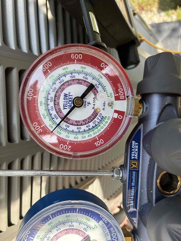 # HVAC Install - System Start Up

Completed installation and system start-up procedures for new HVAC equipment. Connected manifold gauge set to service ports and verified refrigerant pressures on both high and low sides of the system. Measured operating pressures using Yellow Jacket diagnostic gauges, confirming readings were within manufacturer specifications for proper system operation. Inspected condenser coil and heat exchanger components for proper installation and clearance. Verified all electrical connections and wiring were secure and properly terminated. System tested and confirmed operational with appropriate superheat and subcooling values achieved.