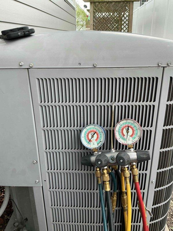Responded to no cooling complaint on residential air conditioning system. Connected manifold gauge set to outdoor condenser unit and evaluated refrigerant pressures and system performance. Diagnosed cooling issue and performed necessary service procedures to restore proper system operation. System tested and confirmed operating within manufacturer specifications upon completion.