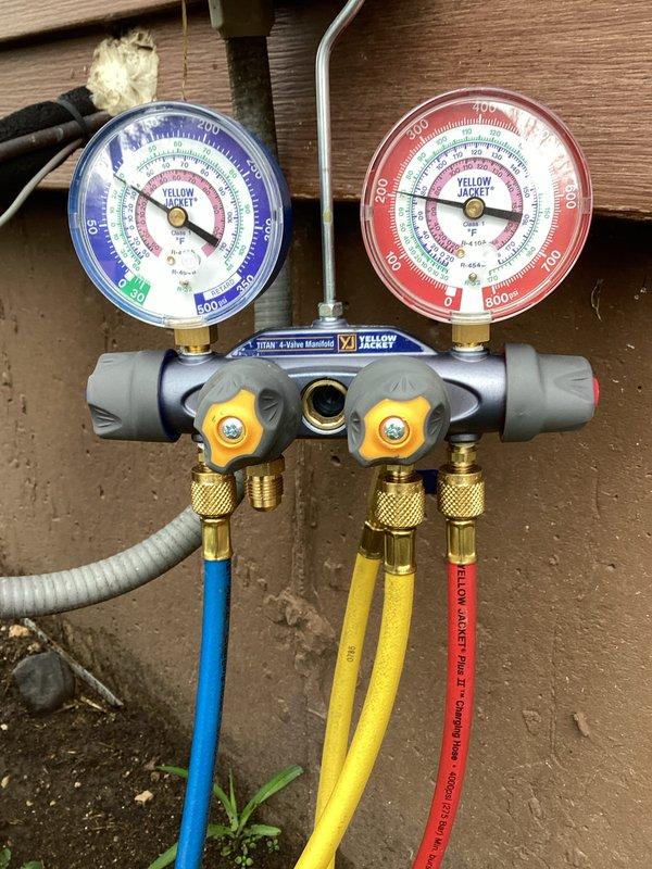 Performed routine HVAC maintenance agreement service on residential air conditioning system. Conducted comprehensive system evaluation using manifold gauge set to measure refrigerant pressures and verify proper system operation. Accessed condensing unit electrical components to inspect wiring connections, contactors, and capacitors for signs of wear or damage. All refrigerant levels were within manufacturer specifications, and electrical connections were found secure with no service issues identified. System is operating efficiently and ready for continued seasonal use.