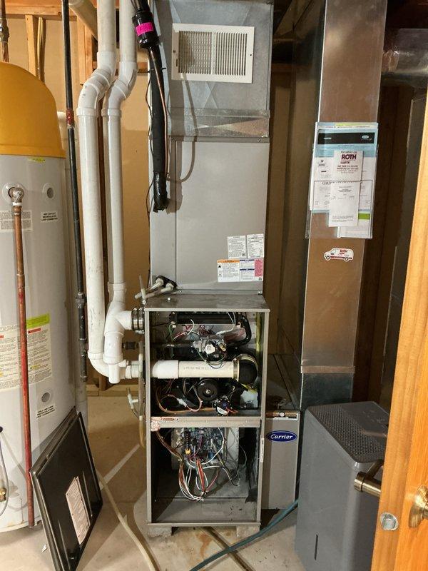 Performed warranty inspection on Carrier furnace system. Accessed internal components to verify proper operation of blower motor assembly, pressure switch, and electrical connections. All components found to be functioning within manufacturer specifications with no deficiencies noted at time of service.