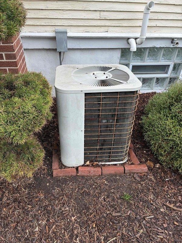 Completed HVAC system replacement estimate for residential property. Evaluated existing Goodman furnace model EL296UH070XE36B and outdoor condensing unit, both showing signs of age and wear. Provided replacement options and specifications for new high-efficiency heating and cooling equipment.