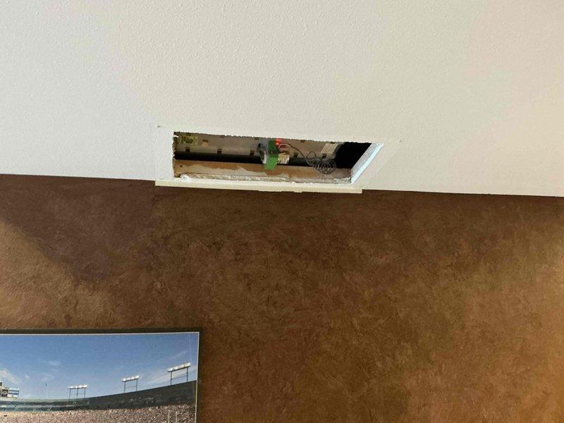 Completed HVAC system estimate for full equipment replacement in residential property. Assessed existing ductwork system in attic space, including metal supply plenum and PVC condensate drainage lines. Documented current system configuration and access points through interior ceiling opening to provide comprehensive replacement proposal for new heating and cooling equipment installation.