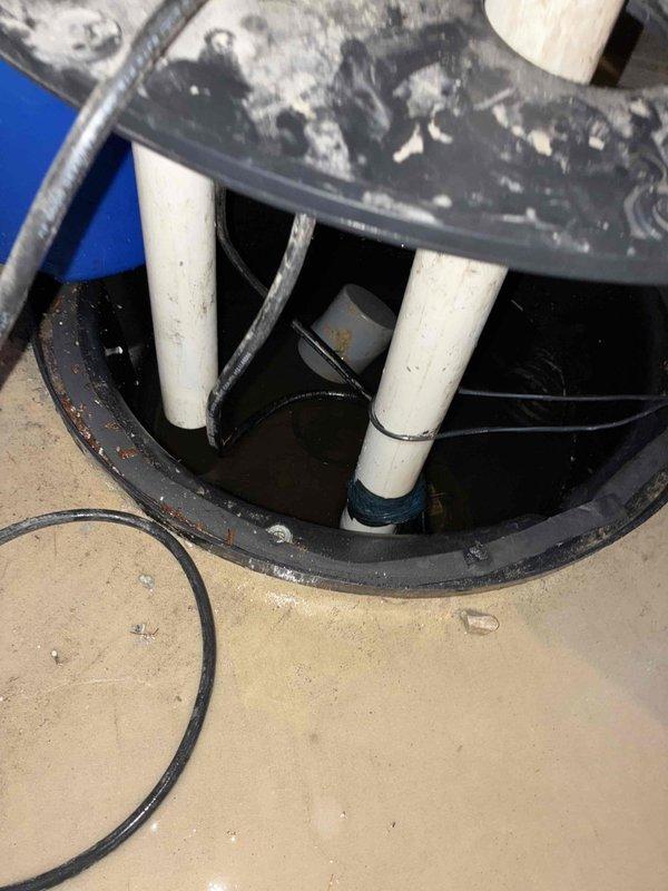 Performed comprehensive inspection and maintenance of residential sump pump system. Verified proper operation of pump mechanism, checked all PVC discharge piping including Schedule 40 connections and couplings for secure fit and proper drainage flow. Confirmed electrical connections were secure and functioning correctly, inspected basin for debris accumulation and water level operation. All components found to be in working order with adequate discharge capacity for basement water management needs.
