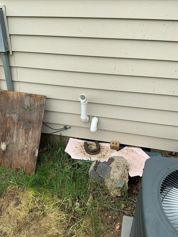 Completed HVAC system replacement at residential property. Removed existing outdoor condensing unit and associated refrigerant lines from crawlspace area, then installed new equipment with proper refrigerant piping, electrical connections, and condensate drainage. Ensured all components were properly secured, insulated, and tested for optimal performance before finalizing installation.