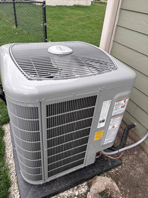 Completed installation and system start-up of residential air conditioning unit. Performed refrigerant charging procedures and verified system pressures using digital manifold gauges, with readings showing 110.1 psig on low side and 379.1 psig on high side, along with superheat of 88°F and subcooling of 145°F. Condenser unit properly positioned on concrete pad with appropriate clearances, refrigerant line sets insulated and routed to building, and all electrical connections completed per manufacturer specifications.