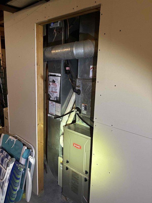 Completed HVAC system evaluation for replacement estimate on existing Bryant furnace located in interior mechanical closet and Carrier Puron condensing unit positioned on exterior concrete pad. Assessed current equipment condition, ductwork configuration, electrical connections, and refrigerant line routing to determine specifications and scope for complete system replacement.